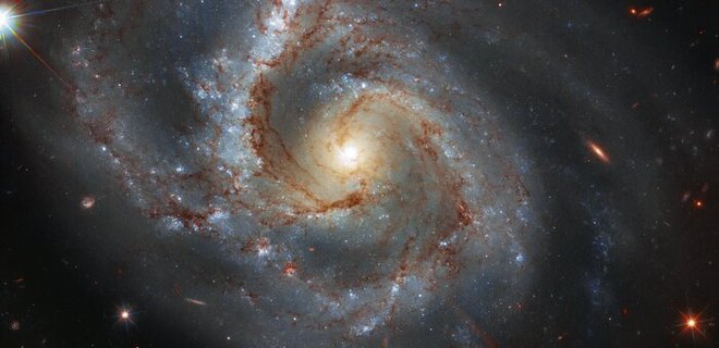 Космічний мікс. Hubble зробив спільне фото галактик різних типів - Фото